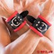 Schwarz / Rote Bondage Handfesseln aus Leder