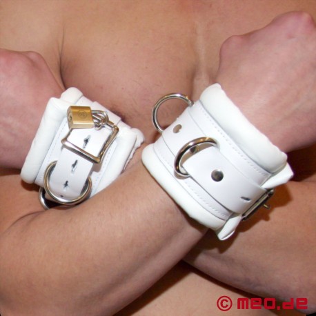 White leather wrist restraints with time lock