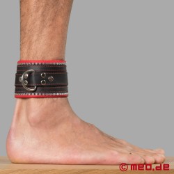 Manette per caviglie in vera pelle di MEO® con dettagli in rosso