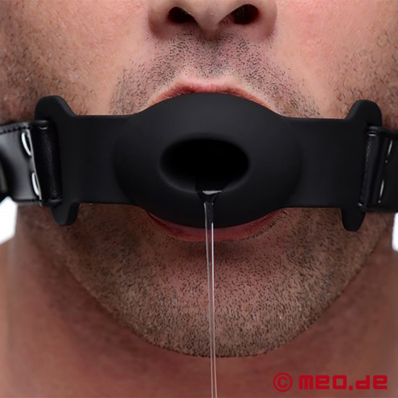 Mouth gag with opening