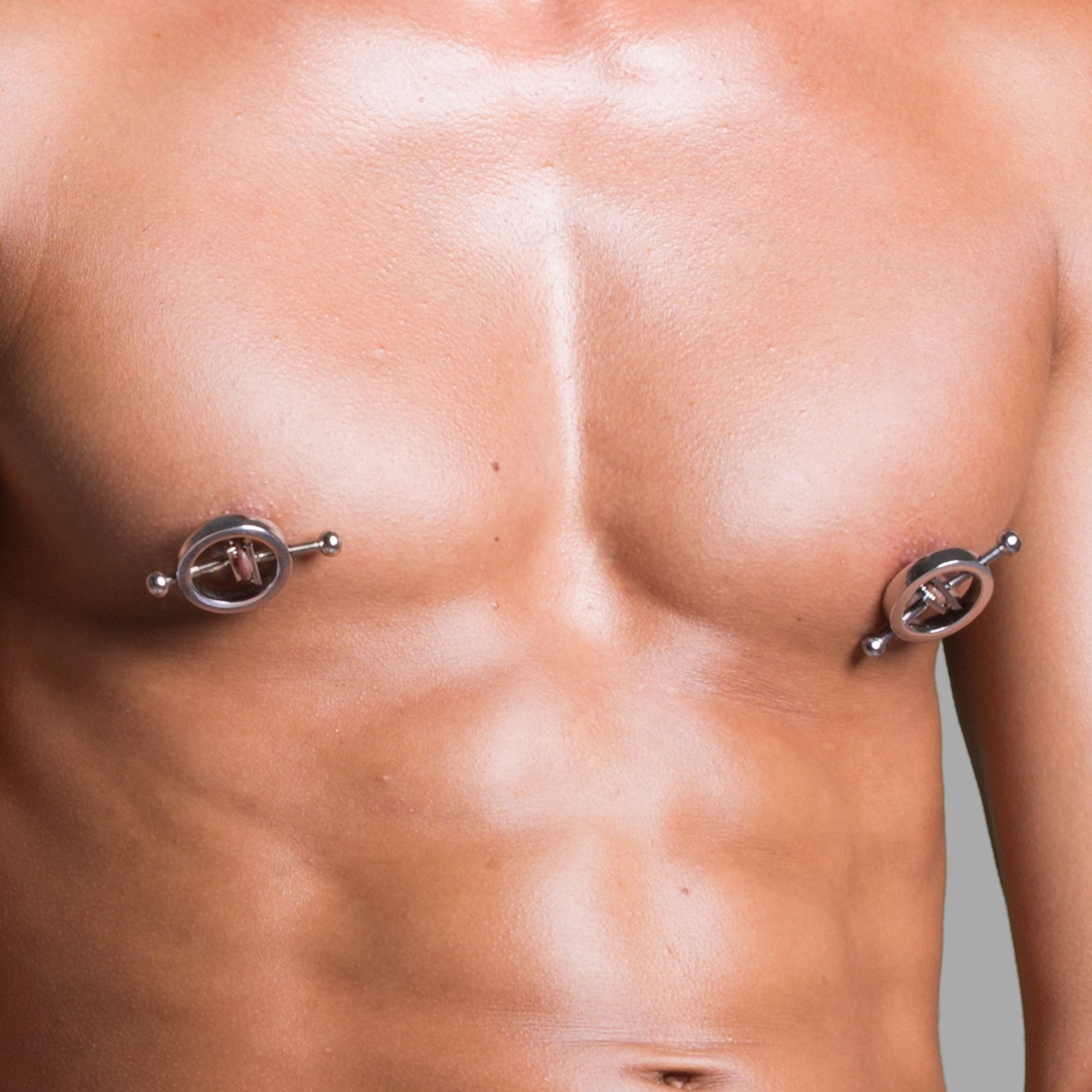 Male nipple clamps photo