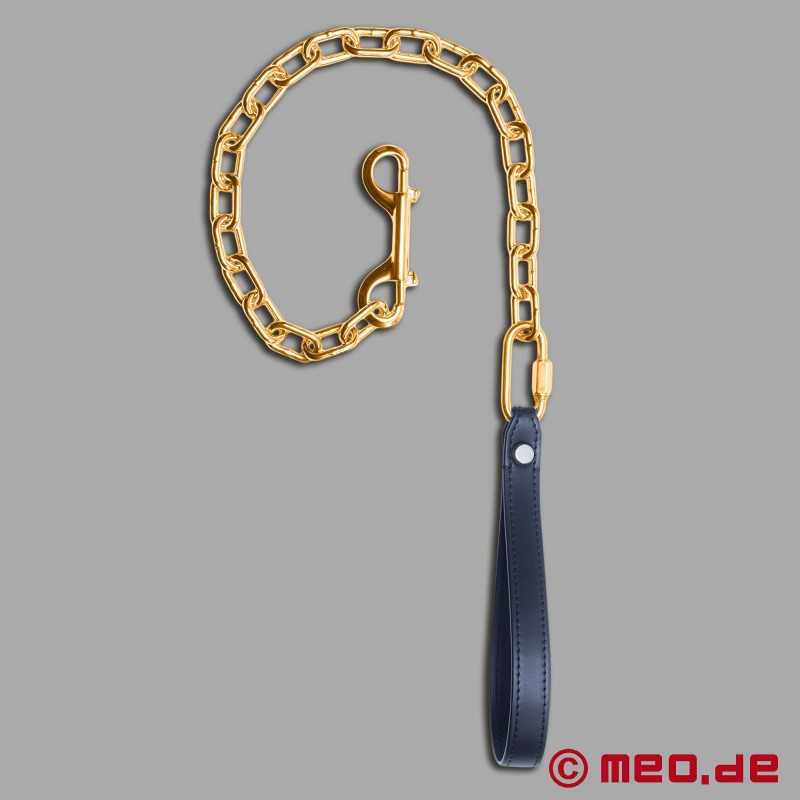Zlaté řetízkové vodítko BDSM - symbol luxusu a kontroly