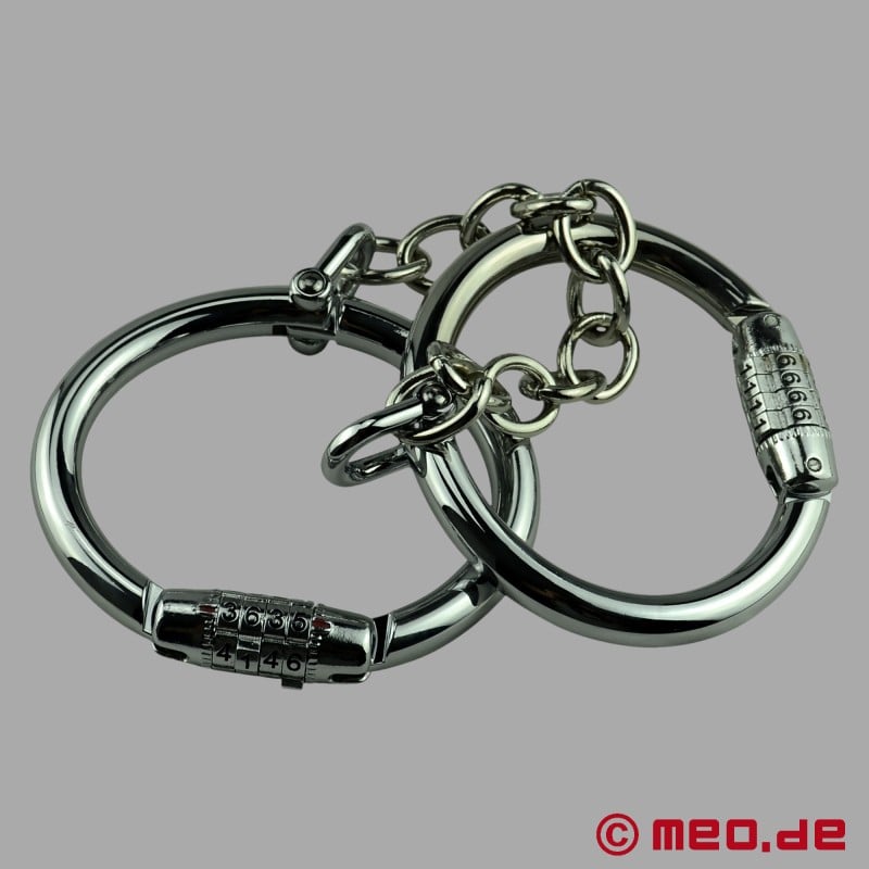 Steel ankle restraints for self bondage with combination lock