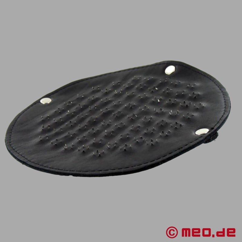 BDSM hand paddle with spikes from Dr. Sado