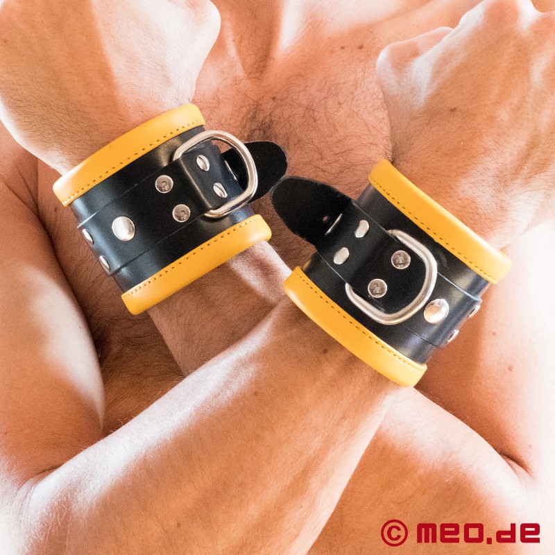 Leather wrist cuffs, padded - black / yellow